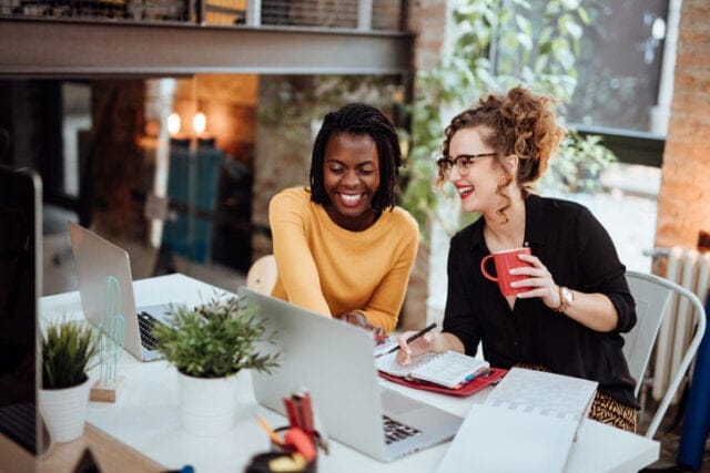 women having office meeting
