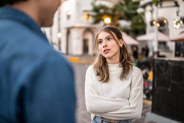 couple having an argument outdoors
