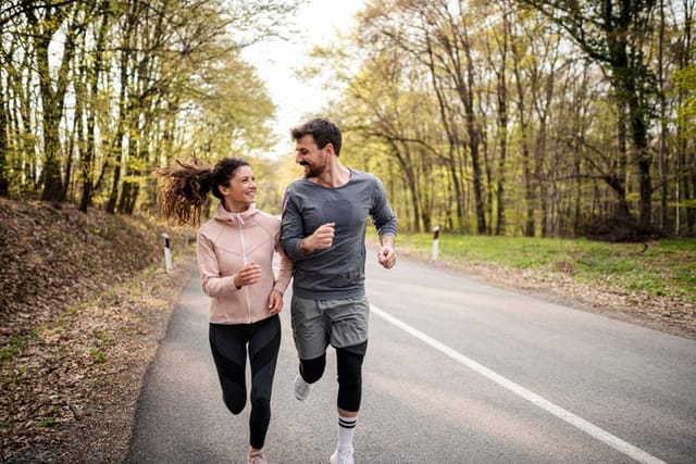 happy couple going for a run