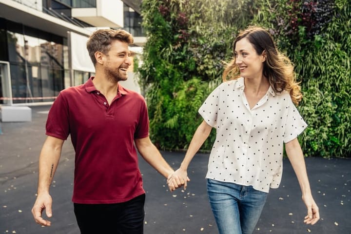 couple holding hands in love