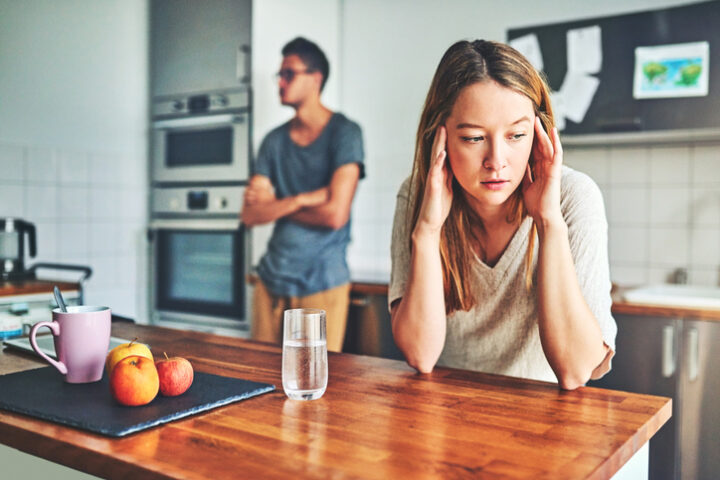 couple arguing in kitchen