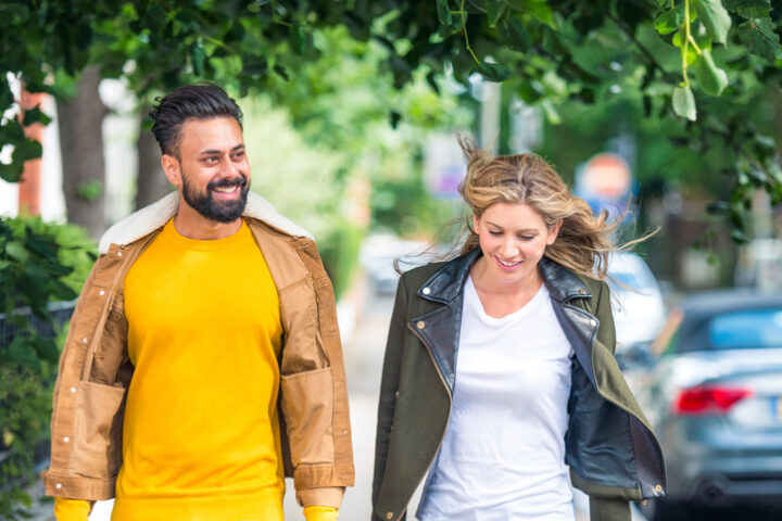 couple walking down street