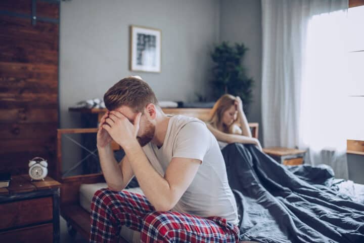frustrated man in bed